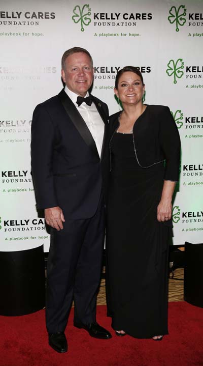 Brian and Paqui Kelly seen at the Kelly Cares Foundation's 5th Annual Irish Eyes Gala at the JW Marriot Essex House, on Monday, March 16, 2015 in New York. Established in 2008 by Notre Dame head football coach Kelly and his wife, the Kelly Cares Foundation has donated over $2 million to support causes locally, nationally and globally. (Photo by Stuart Ramson/Invision for Kelly Cares Foundation/AP Images)