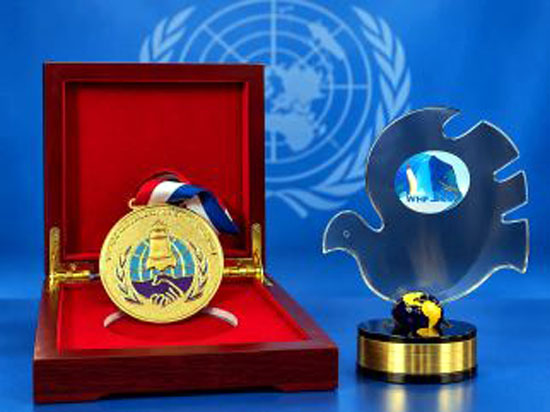 WHF World Harmony Award trophy and commemorative medal.