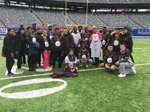 Team Steelers celebrating after a great game at MetLife Stadium