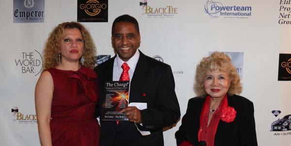   Irina Gubenko recieving her door prize from Michael Cole