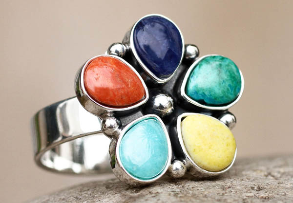 Peruvian gems blossom with colorful energy in a uniquely striking ring handmade for NOVICA.com by artisan Fermín Vilcapoma in Peru