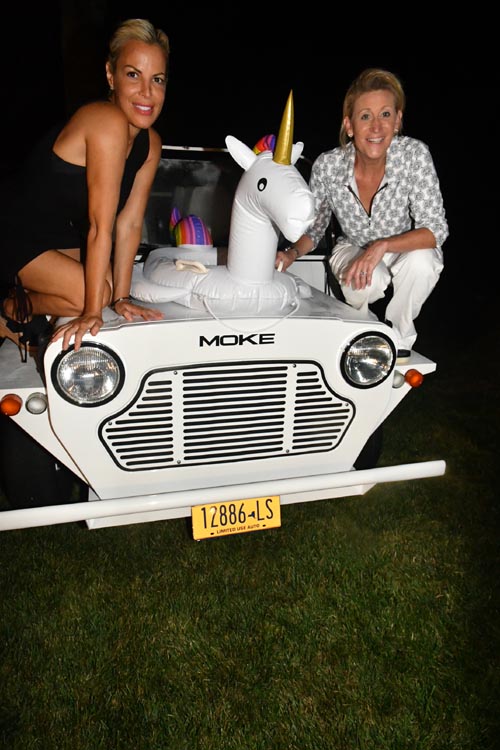 Danielle Reda and Judith M. Kasen-Windsor on super Moke. Photo by: Rose Billings/Blacktiemagazine.com