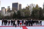 Figure Skating in Harlem student Crystal Burgess reads a letter from First Lady Michelle Obama at the 2012 Skating with the Stars Gala at Wollman Rink, Central Park, New York City. Standing with Ms. Burgess is Figure Skating in Harlem Founder & Executive Director Sharon Cohen, and on the red carpet (from left-right) are: Scott Hamilton, Tamara Tunie, Soledad O’Brien, Kimberly and Stephen Bollenbach, Candace Matthews,