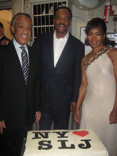 12-22-11 Al Sharpton (L) joins cast members Samuel L. Jackson and Angela Bassett backstage to celebrate Jackson's birthday with a cake after the matinee performance of "The Mountaintop" at the Bernard B. Jacobs Theatre. 242 West 45th St. Wednesday afternoon. 12-21-11
