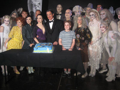 06-16-11 The cast of "The Addams Family" with the cake to celebrate the 500th performance on stage at the Lunt-Fontanne Theatre. 205 West 46th St. Wednesday afternoon 06-15-11