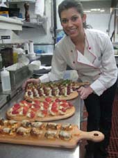 03-29-12 Chef Kristin Sollenne displays four types of her delicious hors d'oeuvres at a food tasting party at Vucciria. 635 Ninth Ave. Wednesday night 03-28-12