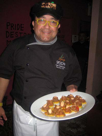 -04-12 Executive Chef Frank Maldonado serves appetizers at the third year anniversary party for Sazon. 105 Reade St. Thursday night 05-03-12