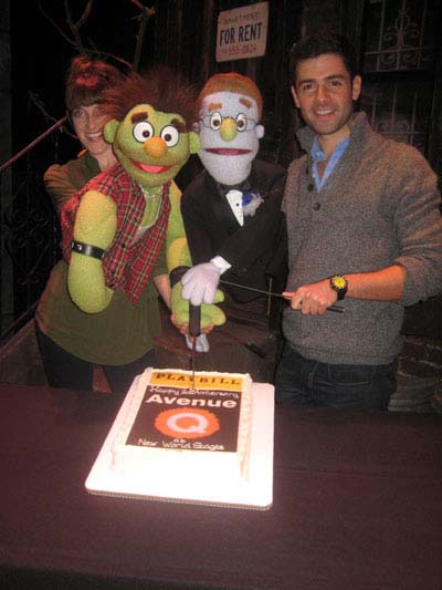 10-22-11 The members of the cast of "Avenue Q" celebrate with a cake the 2nd Anniversary at New World Stages. 343 West 49th St. Friday night 10-21-11