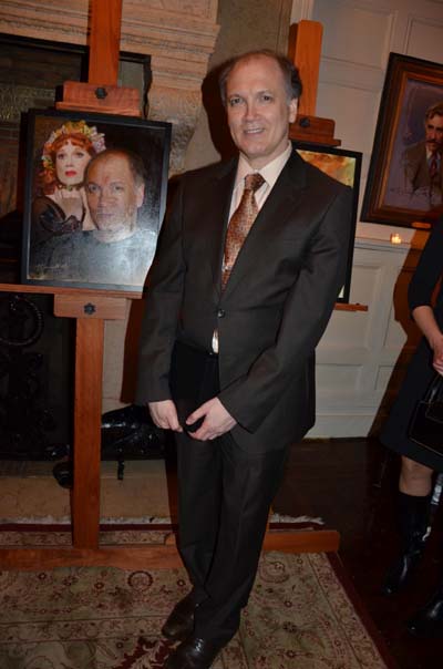 Charles Busch and the portrait of him at the Players Club Hall of Fame