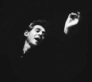 Leonard Bernstein conducting. Photo by: Walter Strate Studio.