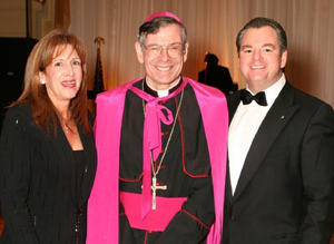 Lynn Lawless, The Most Rev. Bishop Gerald M. Barbarito and Paul Lawless. 