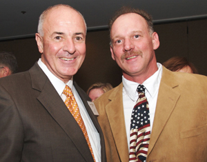 Carmine Calzonetti, President of Tuesdays Children and Charlie Vitchers, Board Member. 