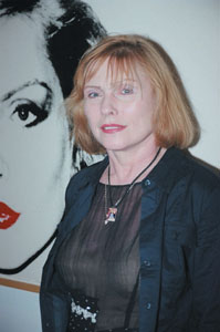  Deborah Harry (Blondie) poses along side her Warhol