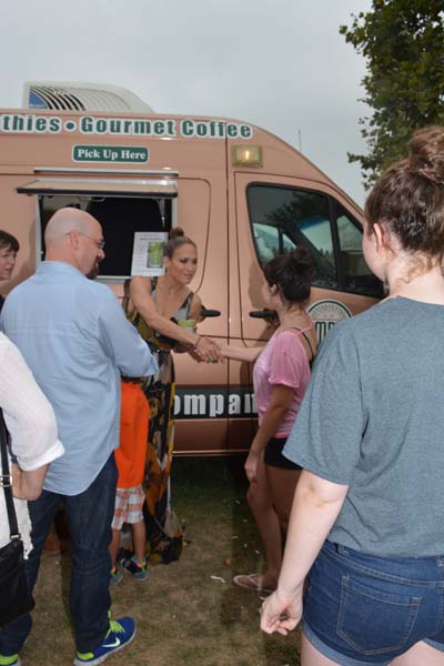 Jennifer Lopez greeting fan at Hampton Classic. Photo by": Rose Billings/Blacktiemagazine.com