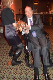 Buttons The pup with Honoree Senator Bob Dole. Photo by: Rose Billings/Blacktiemagazine.com