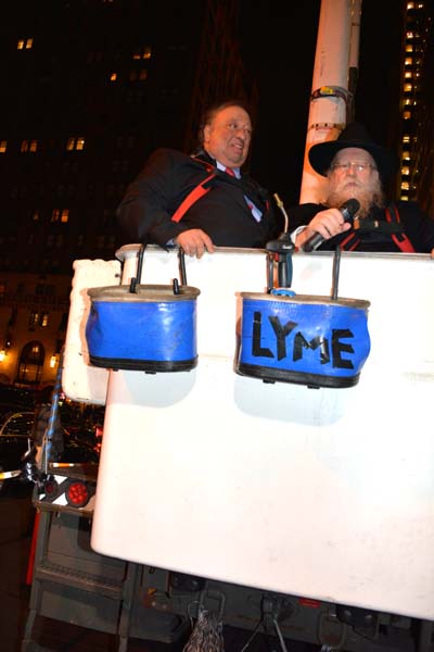 John Catsimatidis and Rabbi Schmuel Butman going to Top of Menorah Together. Photo by: Rose Billings/Blacktiemagazine.com