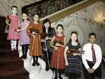 Min Sun Kim, chair of the string department. and the “Third Street Students"