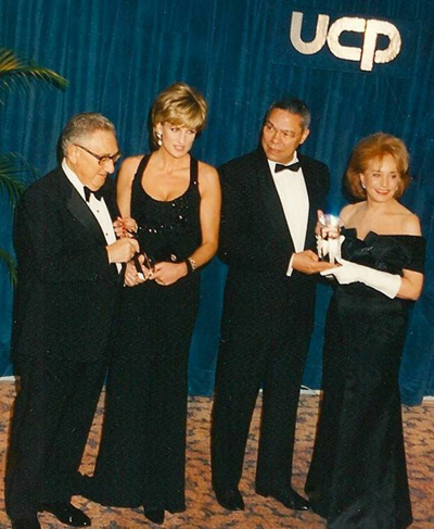 Former Secretary of State Henry Kissinger, Princess Diana of Wales, former Secretary of State Colin Powell & Barbara Walters at UCP/NYC's 1995 Humanitarian Dinner in New York City. UCP/NYC was the first charity in America to honor Princess Diana