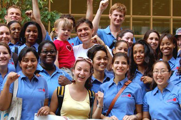 Dr. Oz is surrounded by HealthCorps Coordinators and students who organized the Walk for Fitness down the length of Broadway in New York City
