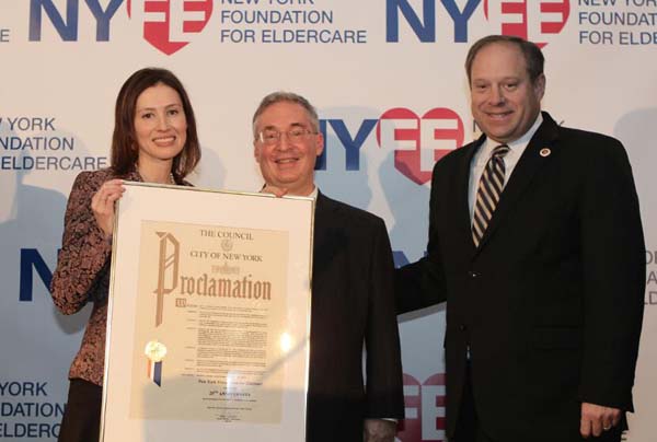 Executive Director Tanya Figelman holds a proclamation issued by the New York City Council, with Chairman Michael Tietz and City Councilmember Rory Lancman of Queens. at the New York Foundation for Eldercare Dinner 2014.  Photo by:  Margarita Volfson