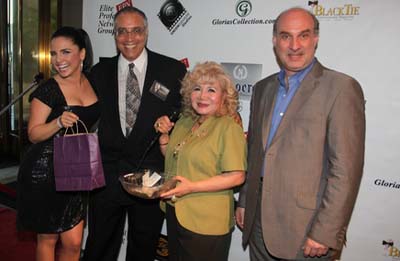 Karen Hoyos, Sam Liebowitz, Gloria T. Cressler and Dr. Thomas Mallios at the giving of door prize.