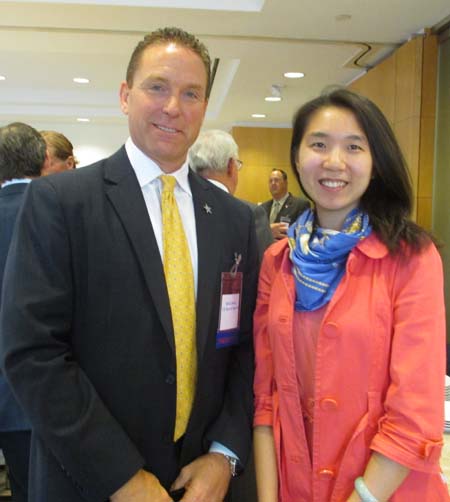 Edward Lowery, US Secret Service; and Ms. Xiaoxue Du, Black Tie Magazine