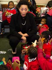 FPWA Executive Director Jennifer Jones Austin and children from the . Photo by: Robert White