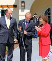 CUTTING THE RIBBON (l. to r.): David Coker, President of Fisher House Foundation; The Honorable Ted Yoho, 3rd Congressional District of Florida; Stephen Cade; Barbara Gentry, Fisher House Foundation Trustee; Rick Fabiani, President of Gainesville Fisher House; Tho