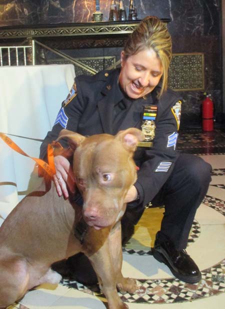Sgt. Barbera Thomas, Office in Charge, Animal Cruelty Investigation Squad, & Cheeto