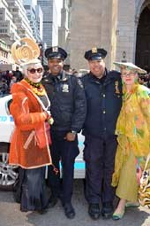Jean and Valerie with NYC's finest in front of St Patrick's Cathedral. Photo by: Rose Billings/Blacktiemagazine.com