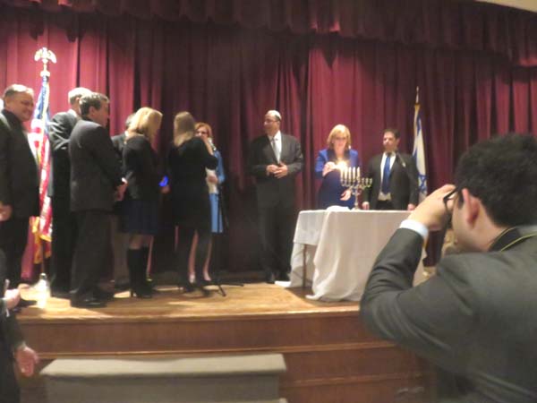 The Lighting of the Menorah. Photo by: Joyce Brooks/Blacktiemagazine.com