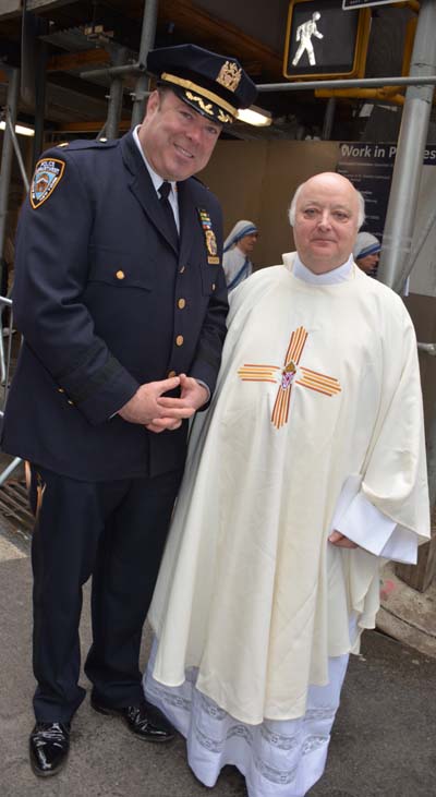 NYPD James McCarthy and Father Leslie Ivers of Church Epiphany on 22nd NYC. Photo by: Rose Billings/Blacktiemagazine.com