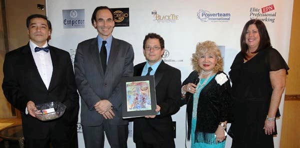 Vincent Matrisciano Director Colgate Group Inc. receiving his door prize