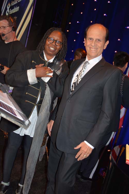 Whoopi Goldberg and Michael Milken.  Photo by:  Rose Billings/Blacktiemagazine.com