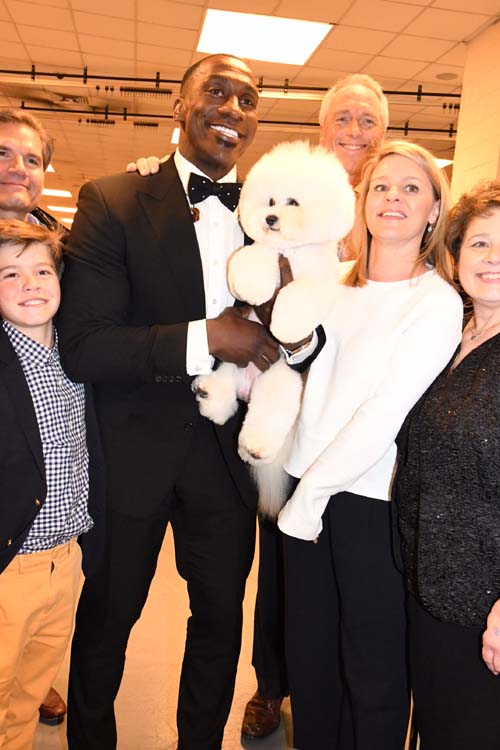 Flynn with Shannon Sharpe and Bill McFadden. Photo by: Rose Billings/Blacktiemagazine.com