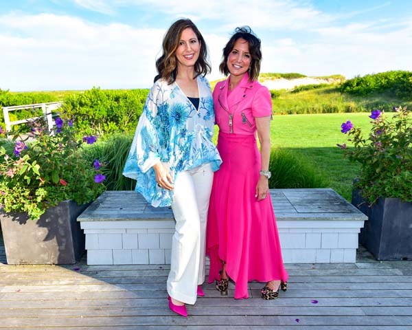 Camille Zamora and Margie Loeb attend Roberto Cavalli Beach Magazine Hamptons Event at Private Residence on July 26, 2018 in Southampton, New York.