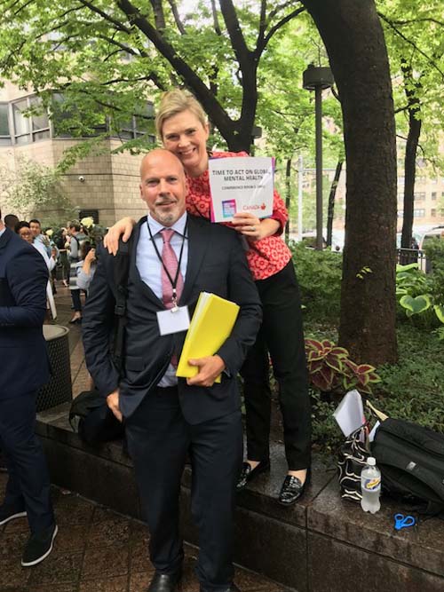 Sarah Kline, Deputy CEO and Kel Currah, advocacy lead, United for Global Mental Health graciously greeting the enthusiastic attendees