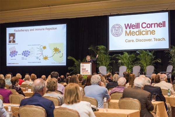 Dr. Silvia Formenti presenting.  Photo by:  Studio Brooke
