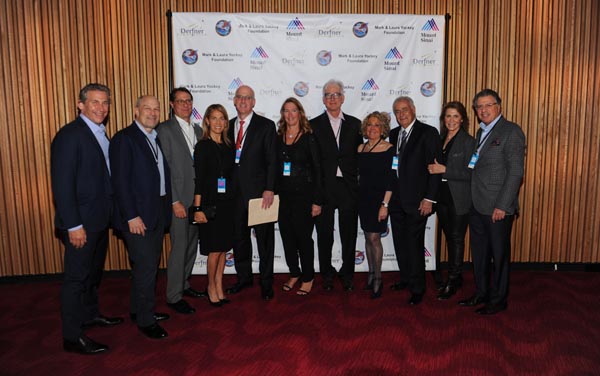 NEW YORK, NY - JANUARY 10: David Abrams, Barry Weiss, David Blitzer, Caryn Zucker, Michael L. Marin, MD, Laura Yockey, Mark Yockey, Penny Lieberman, Jay Lieberman, Lisa Metselaar, and Paul Metselaar attend the Steve Miller Band Benefit Concert to support The Mount Sinai Kyabirwa Village Surgical Facility In Uganda at Jazz at Lincoln Center on January 10, 2019 in New York City. (Photo by Brad Barket/Getty Images for Mount Sinai Health System)