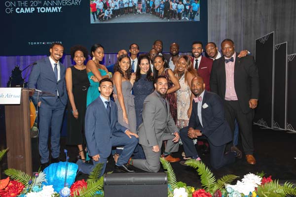 Fatima Shama, Executive Director, The Fresh Air Fund, surrounded by Fresh Air Alumni at 2019 Spring Benefit Honoring Tommy Hilfiger.  Photo by:  Jenna Bascom Photography