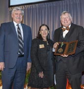 Naveen Jindal School of Management Dean Hasan Pirkul, (left) presented Venise Stuart BS’79 with a Distinguished Alumni Award; President Richard C. Benson (right).Photo by: Randy Anderson, courtesy of The University of Texas at Dallas