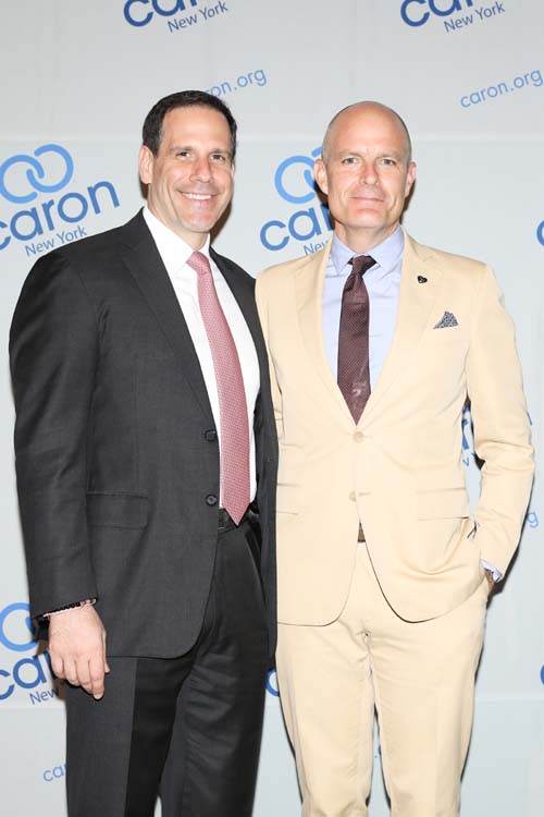 Gary T. Giglio of Goldman Sachs and MusiCares Chairman Michael McDonald. Photos by: Samantha Nandez & Vladimir Weinstein/BFA.com