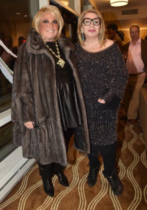 Furrier to Rihanna and Jennifer Lopez who gifted Lieba a white fur coat is seen here with arts patron Joanna Fisher.  Photo by: Patrick McMullan