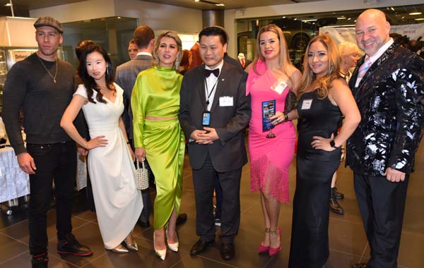 The Lady with the pink dress is Teresa Costa
