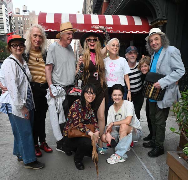 Phoebe Legere hosted a marvelous party at the Chelsea Hotel on July 1. She was celebrating the opening of her exhibition at Chelsea Blick Art Store on 23rd St between 7th and 8th. Her animatronic art installation and paintings can be seen through August 31. From left to right: Yolanda Hawkins, William Niederkorn, rock star Andy Pratt, Phoebe Legere, Marie Ruggierelo, Ron Gustavson, Sue Rakowski, Ivan Galietti. Bottom; Keat Fong, Kate Rockefeller photo by Rose Billings