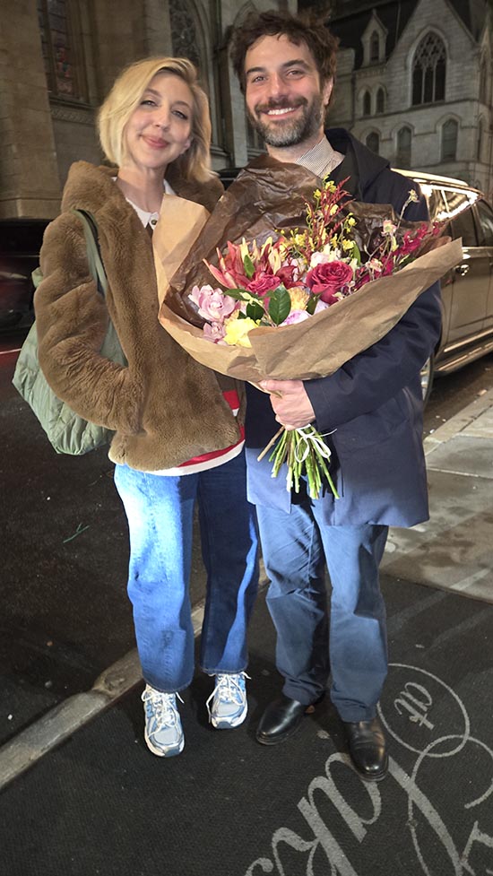 Heidi Garner receiving flowers from her special friend Raymond. photo by: rose billings black tie international magazine