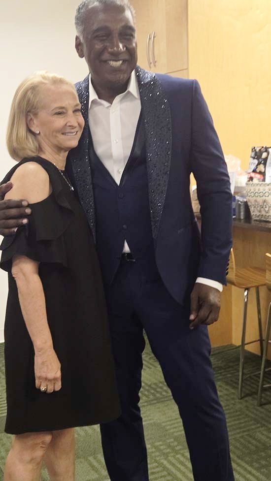 Producer Donna Rubin getting a special hug from Norm Lewis