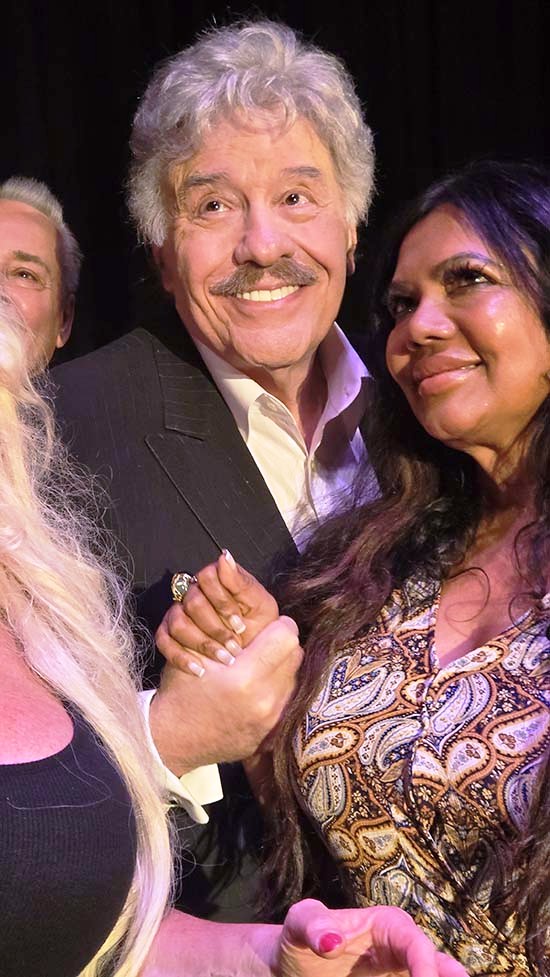 .Tony Orlando receiving a hug from Maryse Selit