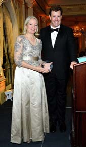 Gala chair Charles Schlangen presents the award to 2017 honoree Tania Pouschine. (Photo by Stephen Smith/Guest of a Guest).