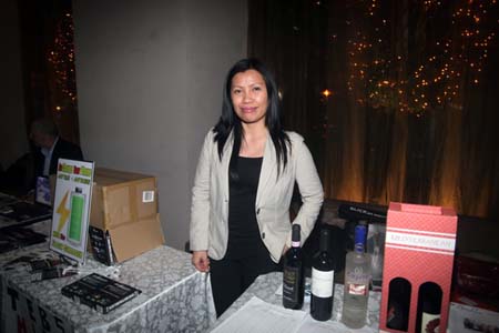 Lydia Garcia in the silent auction table